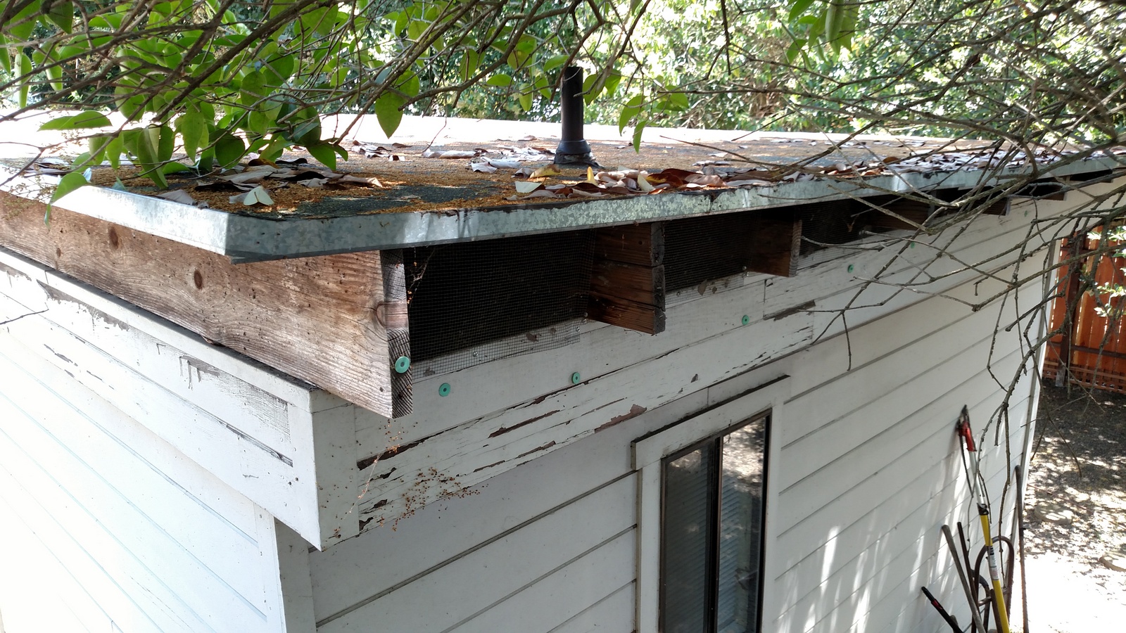 Sonoma Ave Before - one roof o/ another - compounded leaking problem