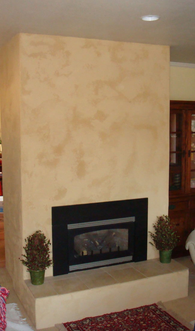 Hexem home remodel - plaster o/ brick FP